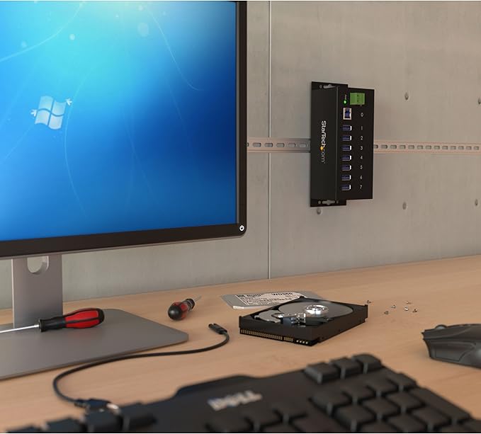 StarTech.com 7-Port USB 3.0 Hub - 5Gbps - Metal Industrial USB-A Hub with ESD Protection & 350W Surge Protection - Din Rail Wall or Desk Mountable - TAA Compliant USB Expander Hub (ST7300USBME)
